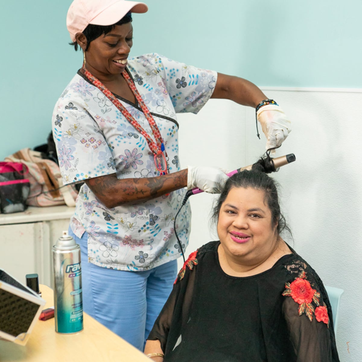 Day Training Services Woman styling another woman's hair