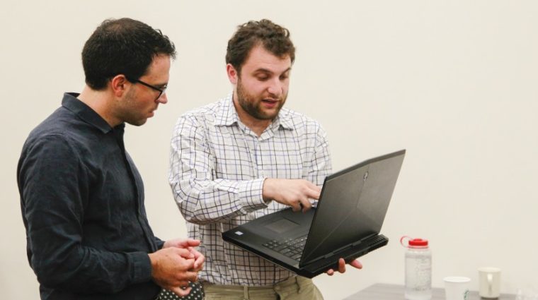 Ca Times.brightspotcdn.com Joseph Riddle, left, director of Neurodiversity in the Workplace, works with David Chidester, 22, on a project