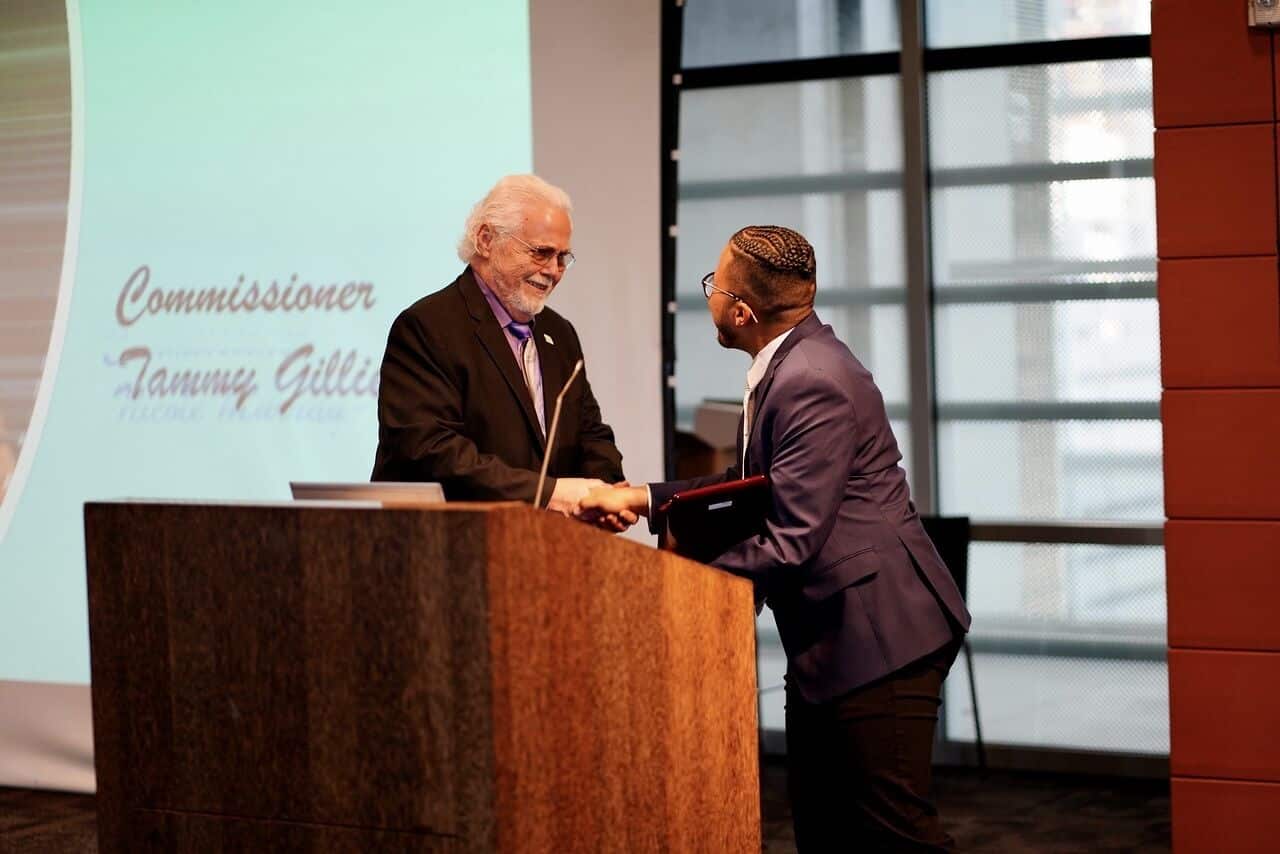 Anthony DeSalis receiving award