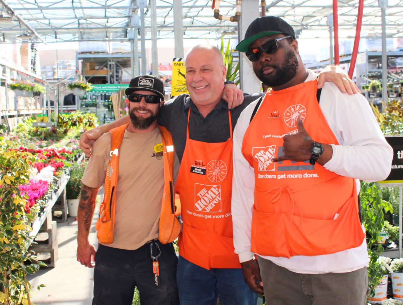 Home Depot Store Manager, Bill Walker, with Butch and Nigel, clients of The Arc of San Diego.