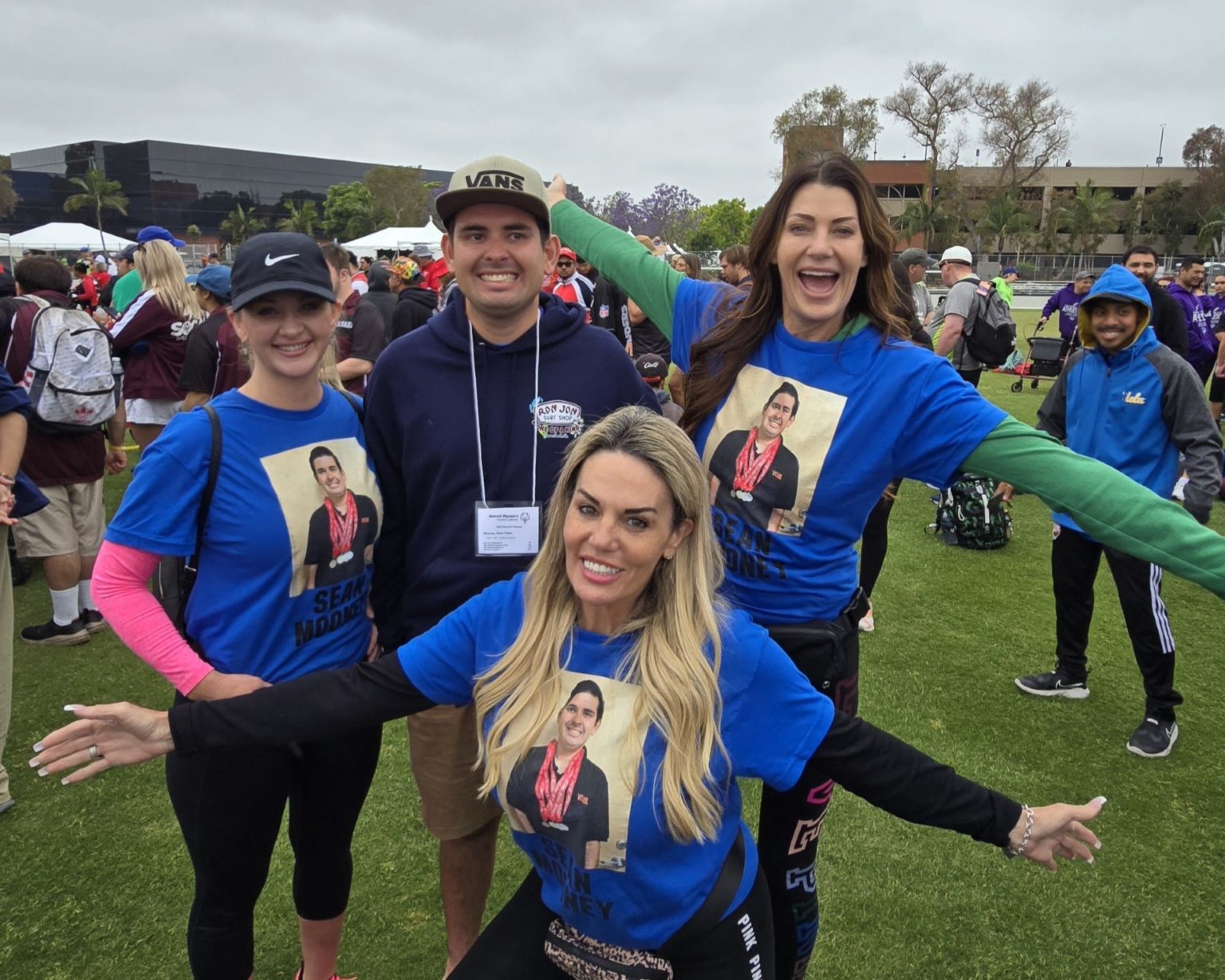 Angie, Vons Manager, and friends at Sean's Special Olympics competition